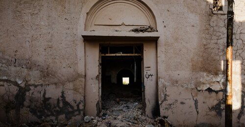 Entrance of a building falling apart